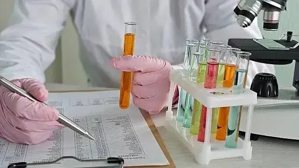 Microbiology practical workshop with laboratory instruments and sample handling